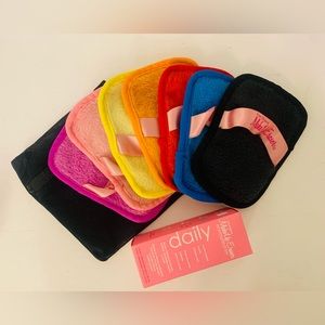 Makeup eraser cloths 7 day set with wash bag +pink eraser cloth new in box.